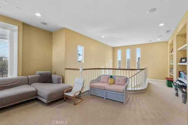 a bathroom with a tub a sink and mirror