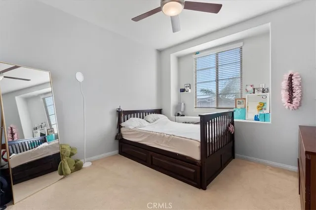 a view of a house with pool table and chairs