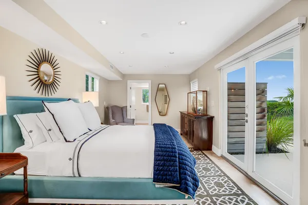 an aerial view of a houses with a yard