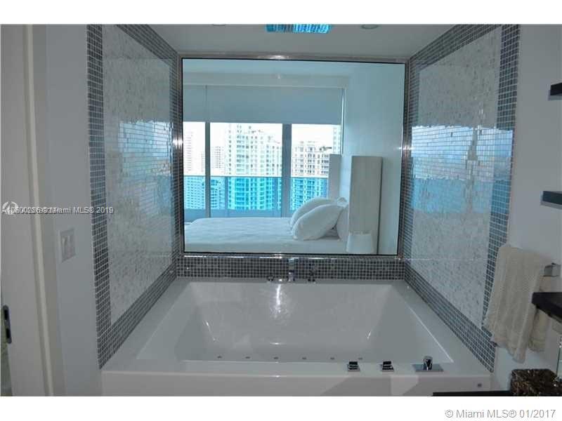 200 South Biscayne Boulevard, Unit 3903 Miami, FL 33131 - Photo 13 of 19 a view of a bathroom with a shower