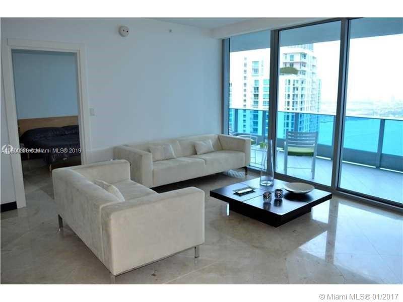 200 South Biscayne Boulevard, Unit 3903 Miami, FL 33131 - Photo 3 of 19 a living room with furniture and a floor to ceiling window