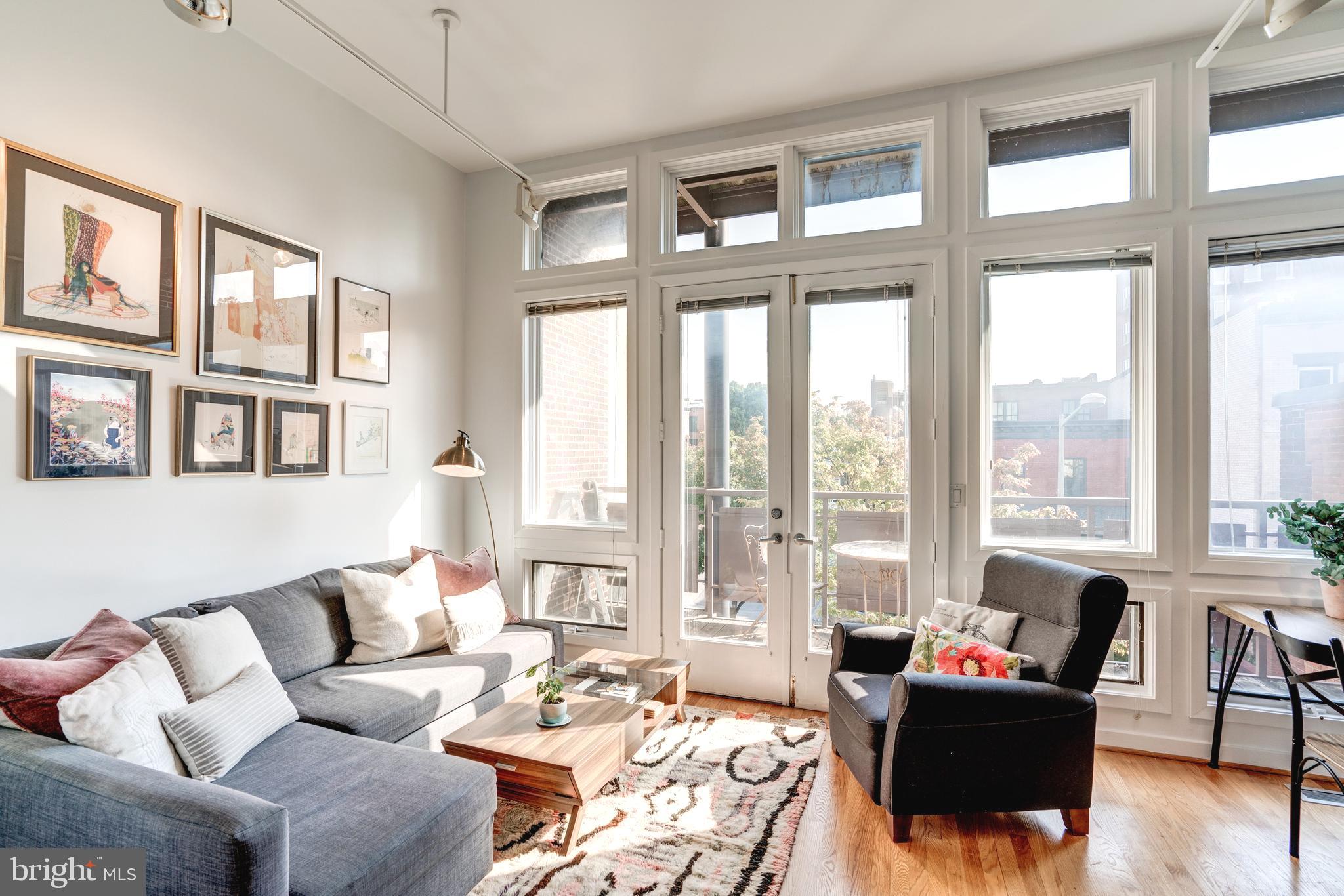 1527 Church Street Northwest, Unit A Washington, DC 20005 - Photo 4 of 31 Sun drenched living area, wood burning fireplace