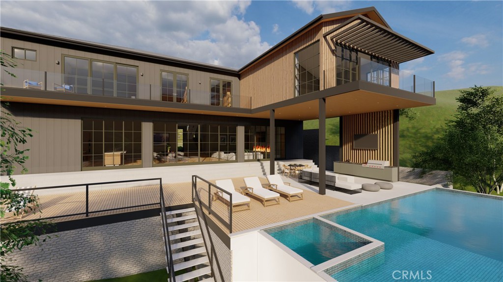 22882 Trigger Street Chatsworth, CA 91311 - Photo 11 of 26 a view of a house with sitting area and furniture