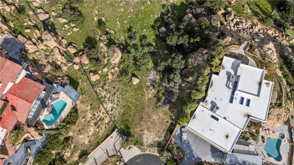22882 Trigger Street Chatsworth, CA 91311 - Photo 15 of 26 an aerial view of a house with a yard