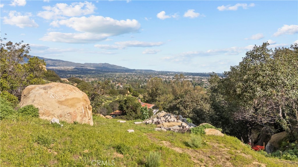 22882 Trigger Street Chatsworth, CA 91311 - Photo 19 of 26 a view of a lake with a mountain in the background