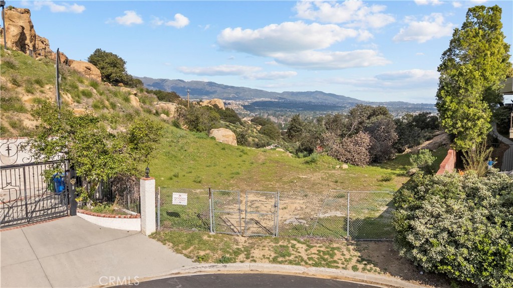 22882 Trigger Street Chatsworth, CA 91311 - Photo 3 of 26 a view of a yard with an outdoor space