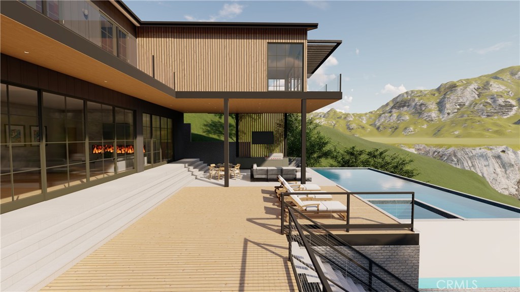 22882 Trigger Street Chatsworth, CA 91311 - Photo 10 of 26 a view of a swimming pool with a patio