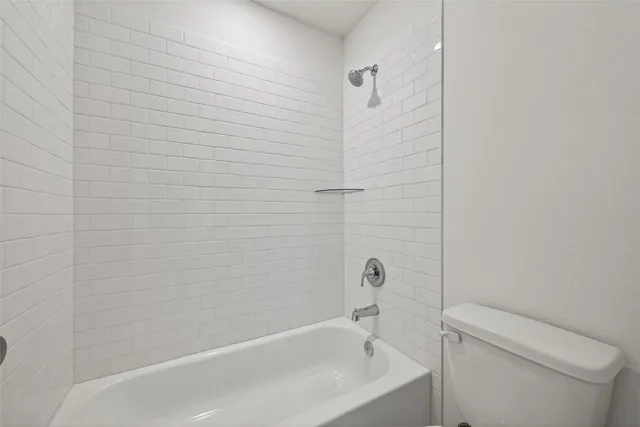 a view of empty room with windows