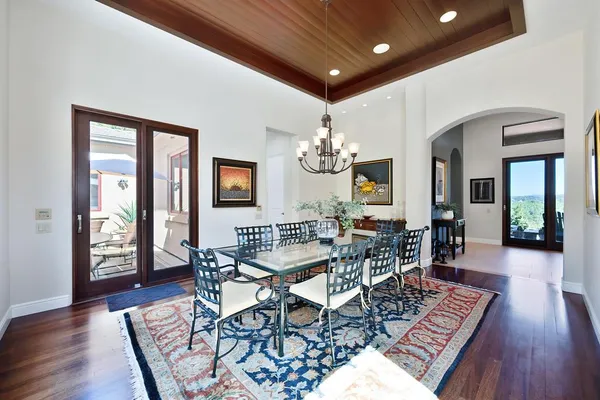 a living room with furniture ceiling fan and a rug
