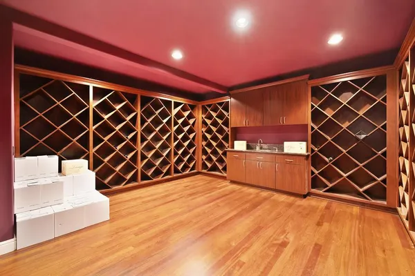 a spacious bedroom with a bed and a window