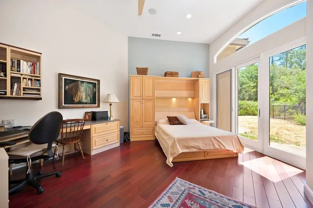 a view of a porch with furniture and a potted plant