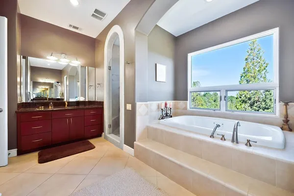 a patio with a table and chairs