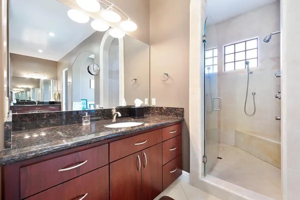 a kitchen with a dining table and chairs