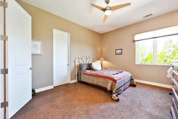 a view of a back yard from a balcony