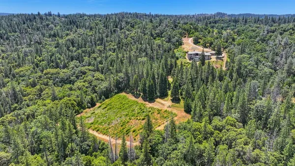 a view of a livingroom with furniture and window