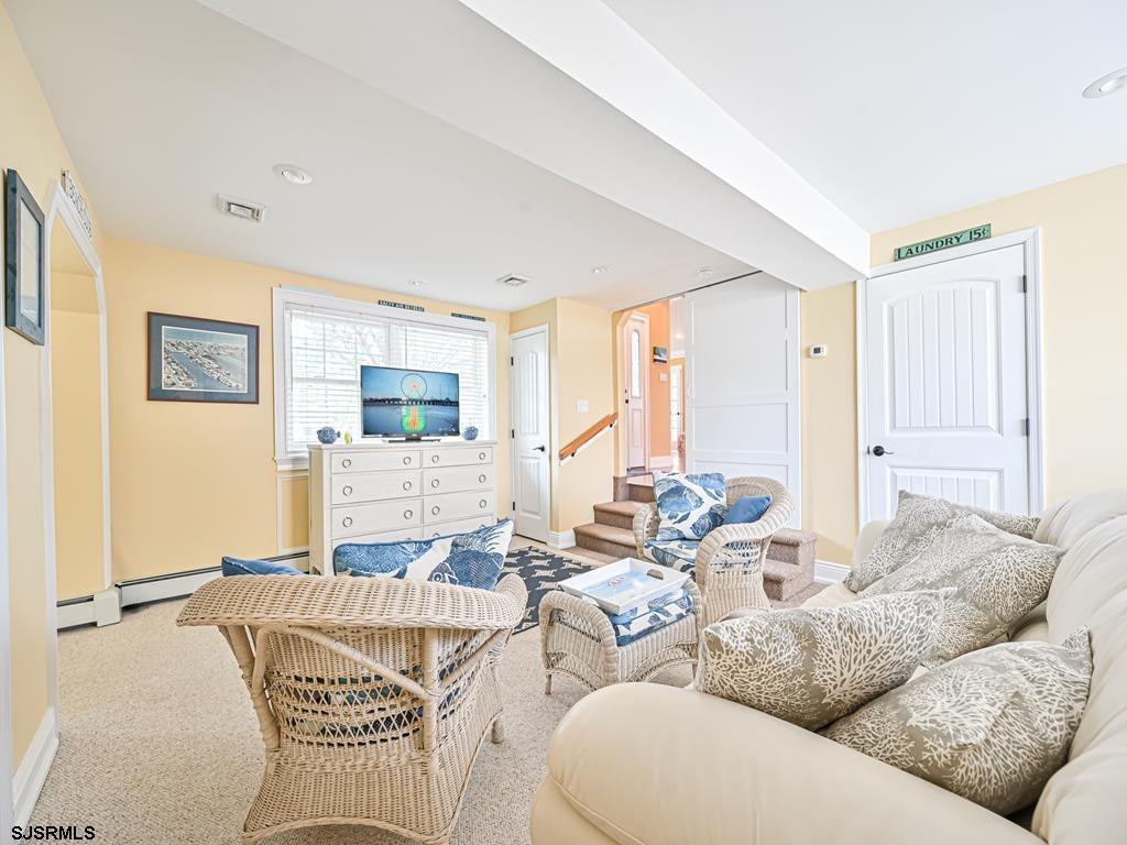 2304 Ocean Avenue Brigantine, NJ 08203 - Photo 16 of 27 a living room with furniture and wooden floor