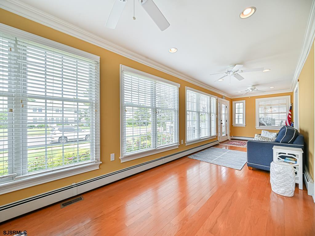 2304 Ocean Avenue Brigantine, NJ 08203 - Photo 18 of 27 a living room with furniture and large windows