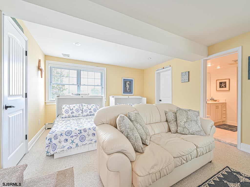 2304 Ocean Avenue Brigantine, NJ 08203 - Photo 19 of 27 a living room with furniture and a large window