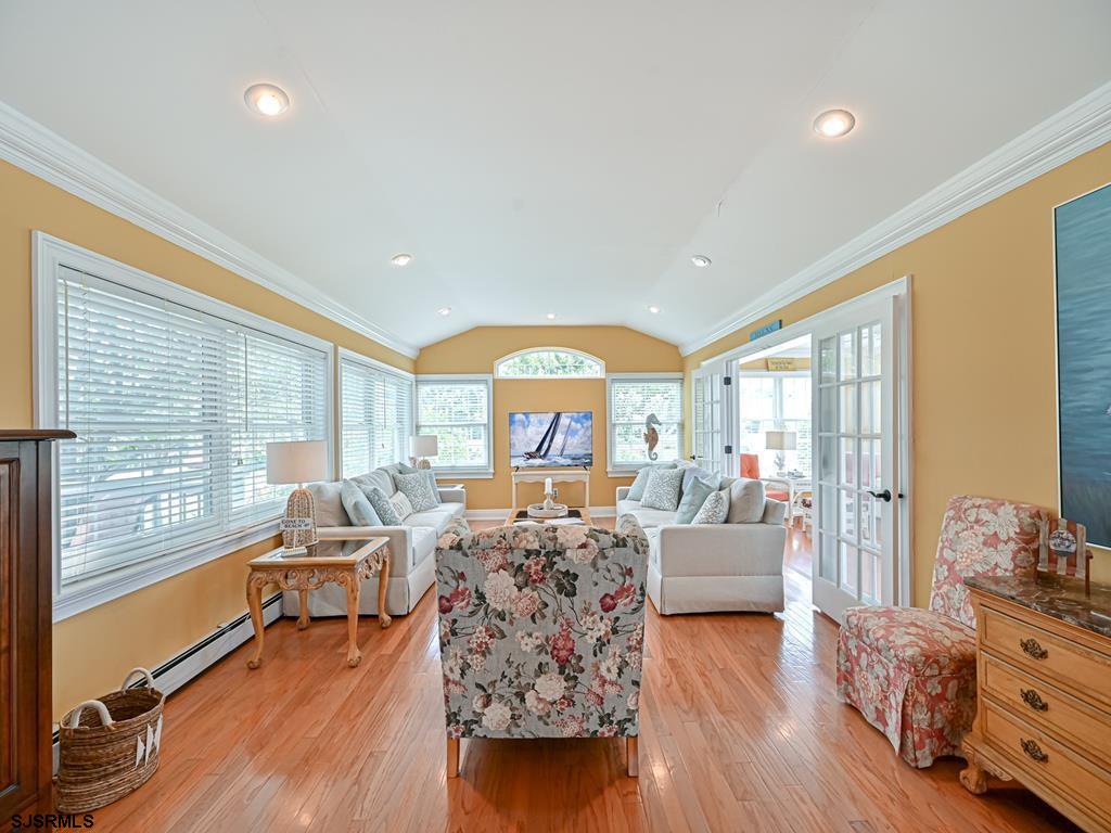2304 Ocean Avenue Brigantine, NJ 08203 - Photo 8 of 27 a living room with furniture and a large window