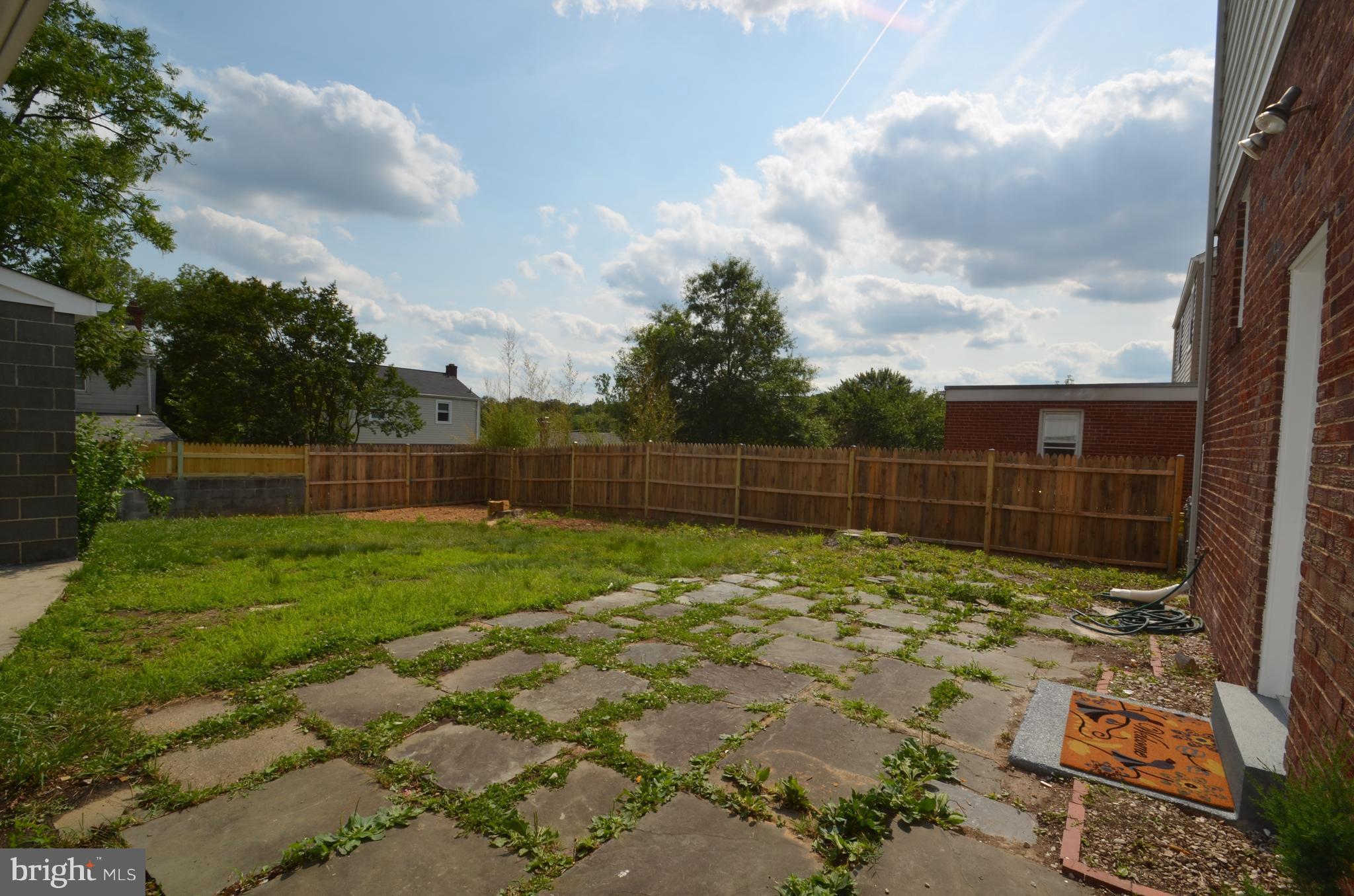 5019 Edgewood Road College Park, MD 20740 - Photo 26 of 29 Slate Patio & Huge Flat Back yard