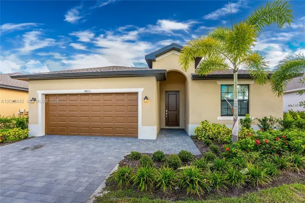front view of a house with a small yard