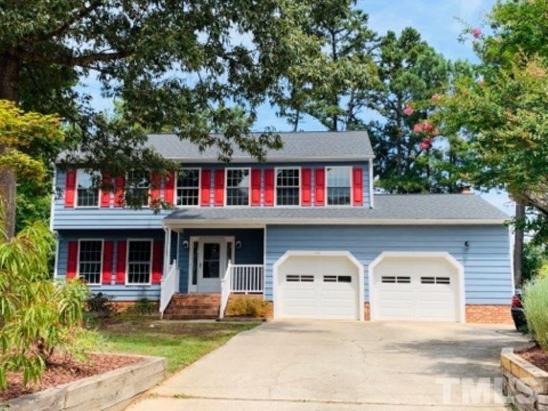 1901 Grove Point Court Raleigh, NC 27609 - Photo 2 of 26 a front view of a house with garden