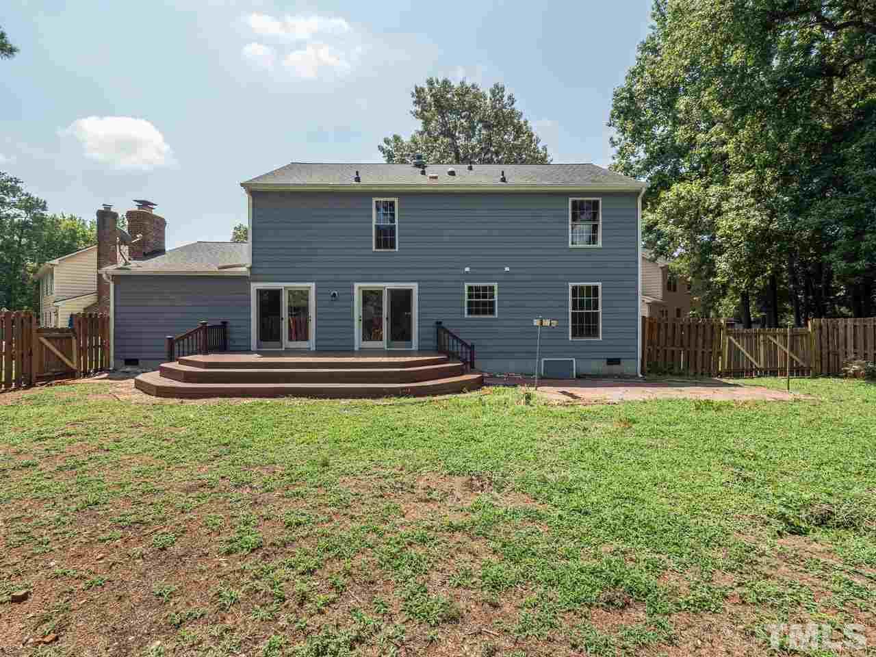 1901 Grove Point Court Raleigh, NC 27609 - Photo 23 of 26 a front view of a house with a yard