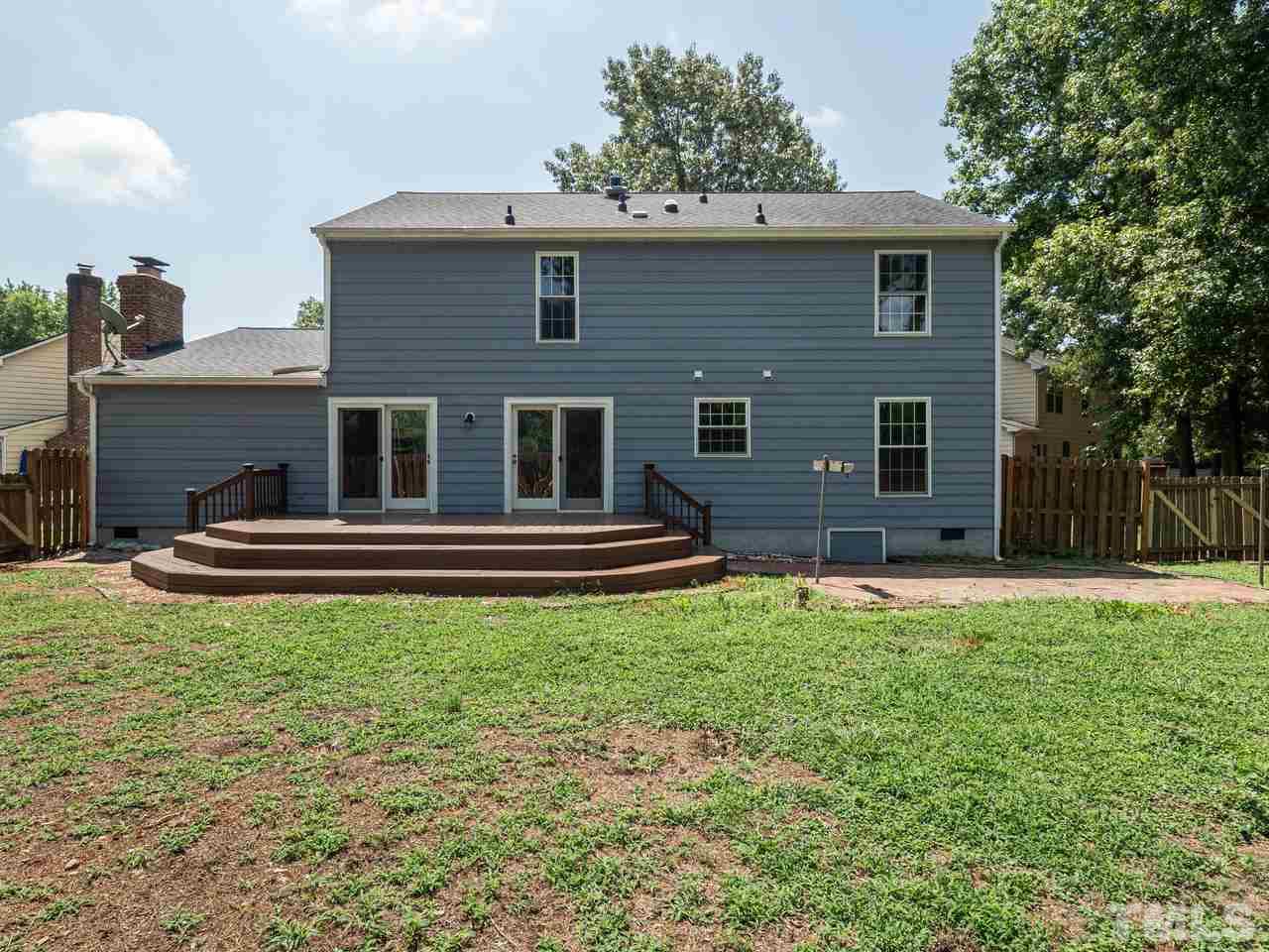 1901 Grove Point Court Raleigh, NC 27609 - Photo 24 of 26 a house view with a backyard space