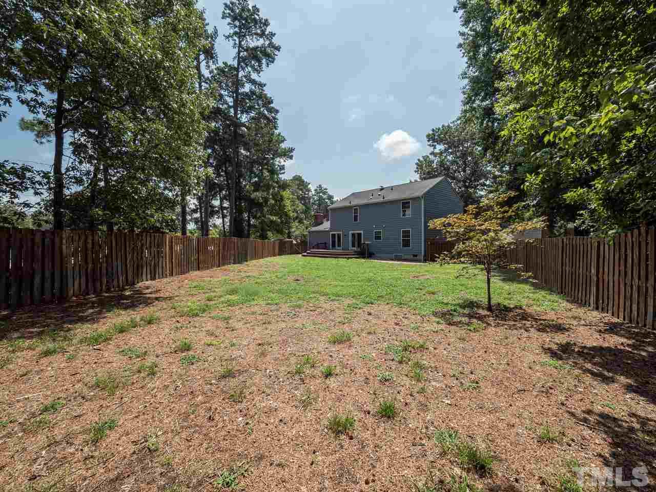 1901 Grove Point Court Raleigh, NC 27609 - Photo 25 of 26 a view of a house with a yard