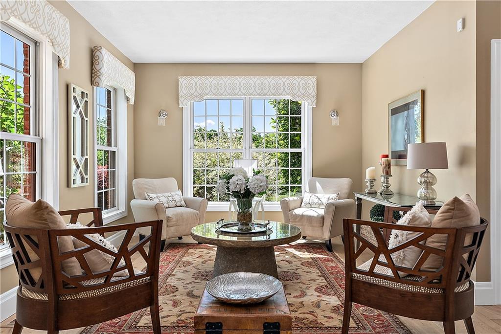 548 Lang Road Sewickley, PA 15143 - Photo 3 of 49 a living room with fireplace furniture and a large window
