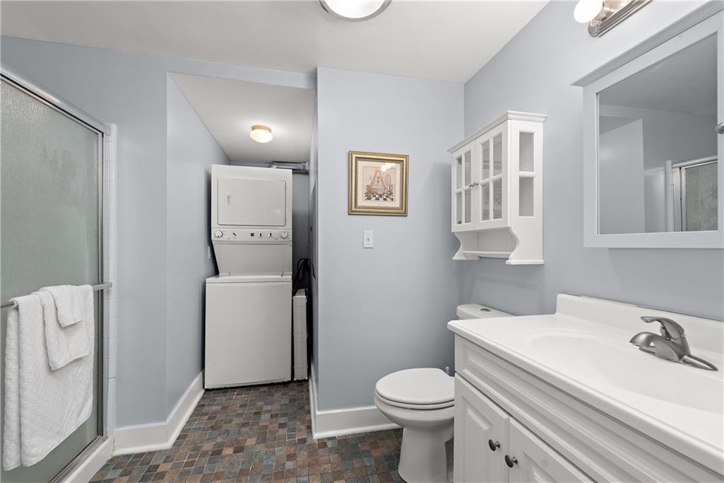 548 Lang Road Sewickley, PA 15143 - Photo 33 of 49 a bathroom with a sink a toilet and shower