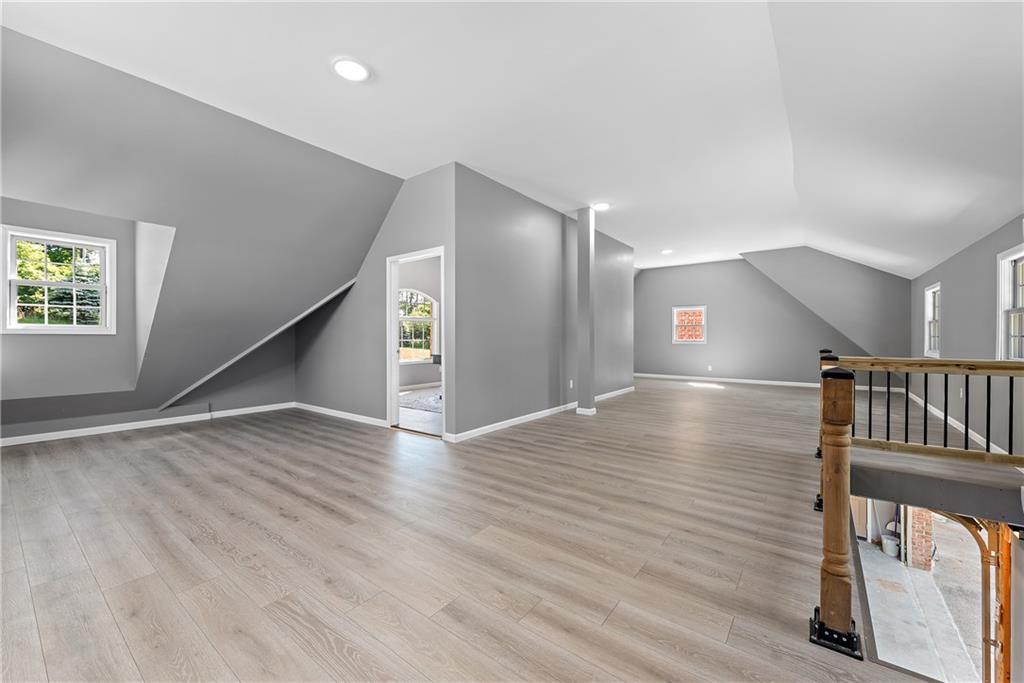 548 Lang Road Sewickley, PA 15143 - Photo 43 of 49 a view of empty room with wooden floor