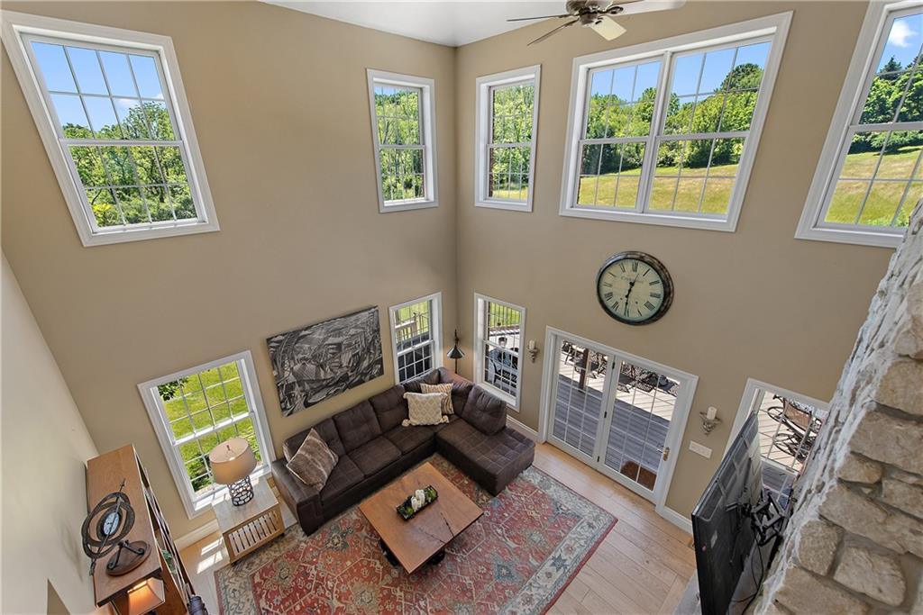 548 Lang Road Sewickley, PA 15143 - Photo 6 of 49 a living room with furniture and a window