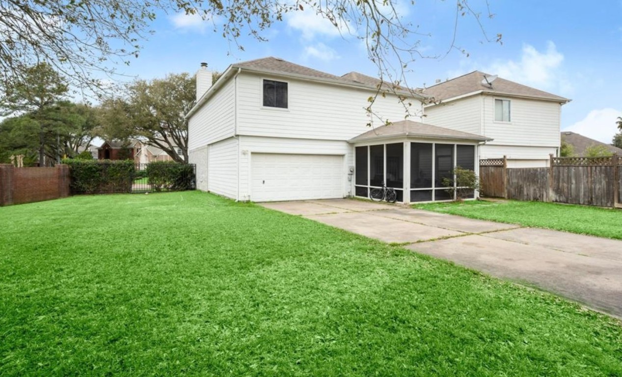 15919 Timber Chase Drive Houston, TX 77082 - Photo 6 of 6 a front view of a house with yard and tree