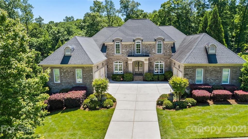 8116 Balcony Bridge Road Huntersville, NC 28078 - Photo 2 of 31 a front view of a house with garden