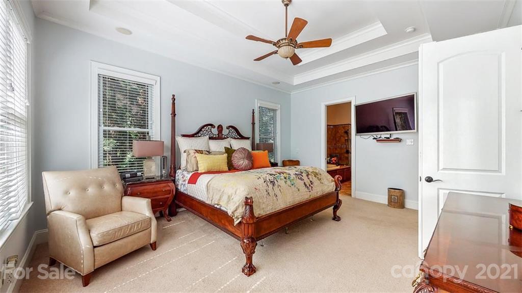 8116 Balcony Bridge Road Huntersville, NC 28078 - Photo 16 of 31 a bedroom with a bed couch and window