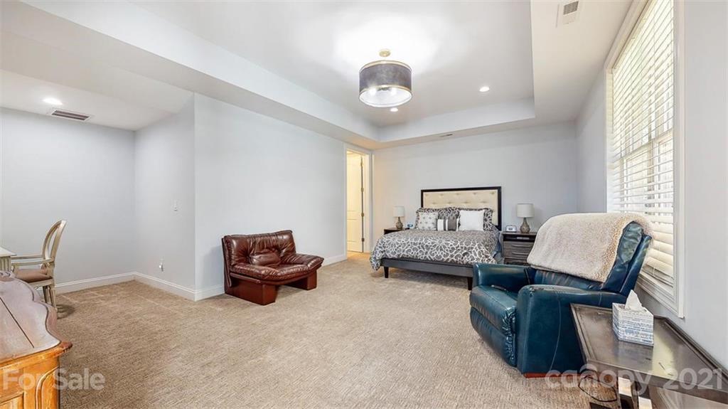 8116 Balcony Bridge Road Huntersville, NC 28078 - Photo 26 of 31 a living room with furniture and a window