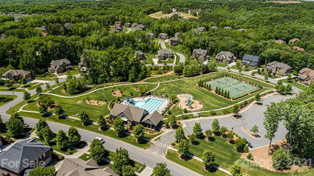 8116 Balcony Bridge Road Huntersville, NC 28078 - Photo 31 of 31 an aerial view of a house with a yard and lake view