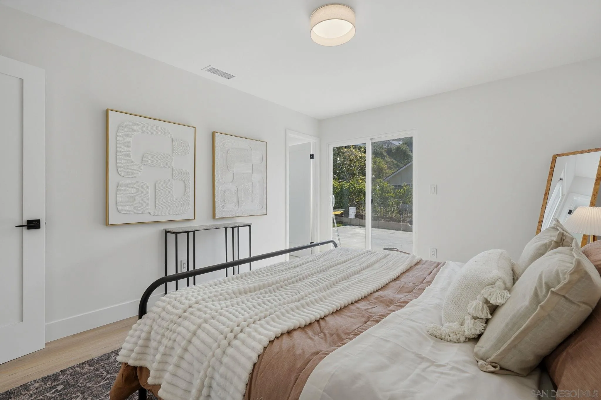 10440 Bosque Drive Lakeside, CA 92040 - Photo 34 of 47 a bedroom with a bed and a window