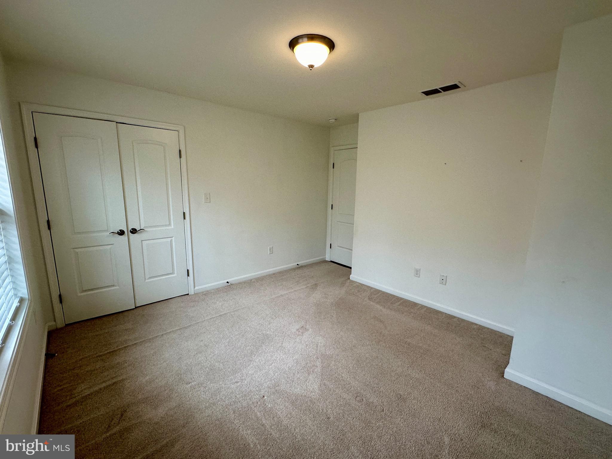 326 Sweeping Mist Circle Frederica, DE 19946 - Photo 33 of 37 a view of an empty room