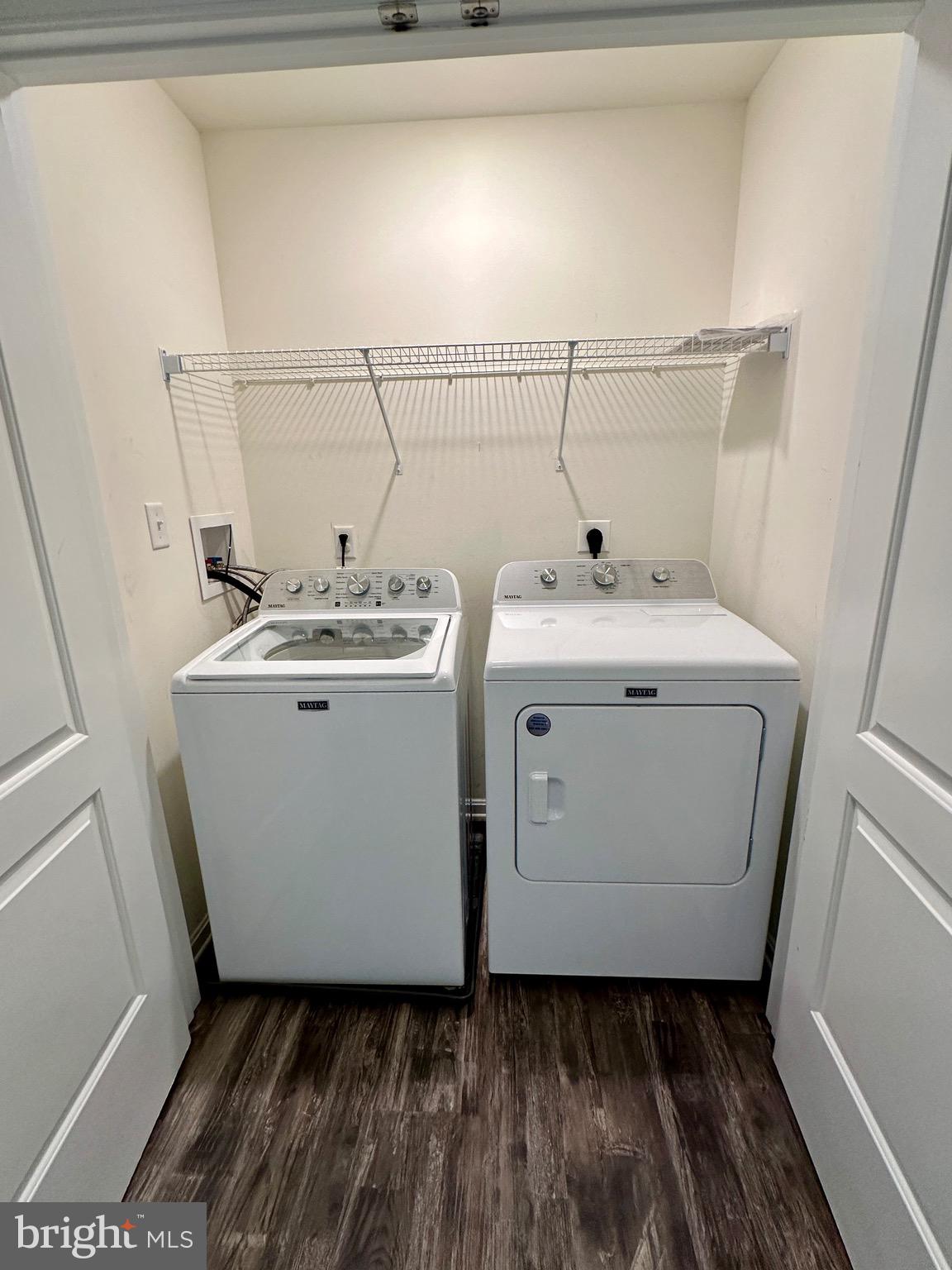 326 Sweeping Mist Circle Frederica, DE 19946 - Photo 34 of 37 a utility room with dryer and washer