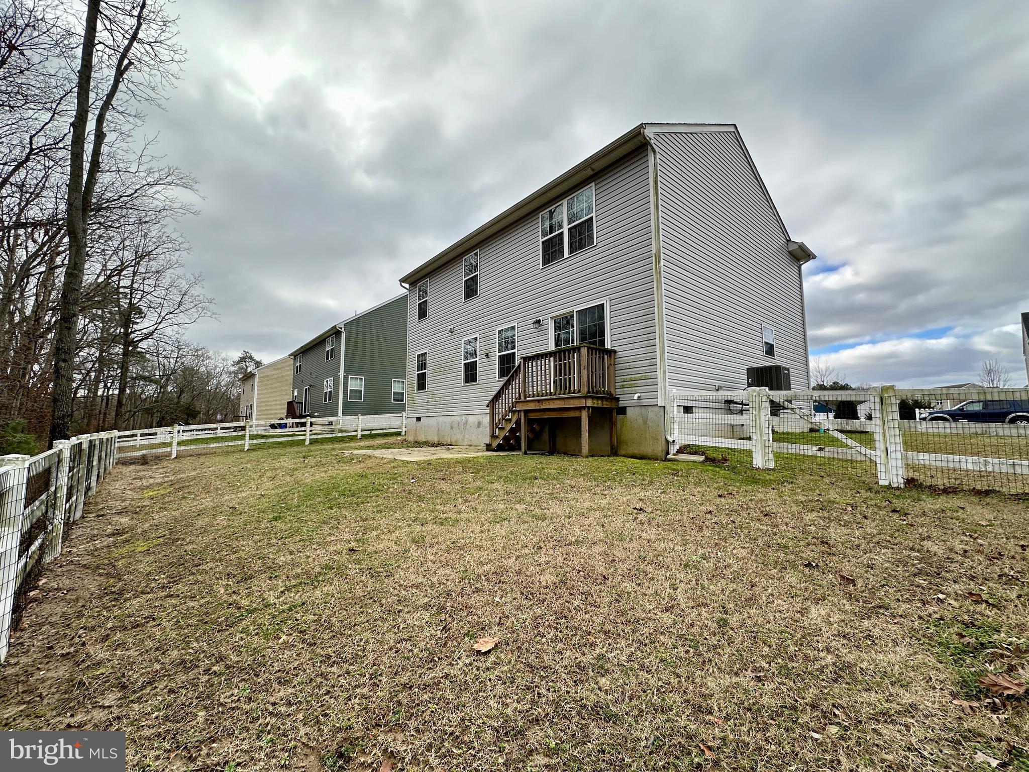 326 Sweeping Mist Circle Frederica, DE 19946 - Photo 4 of 37 a view of a house with backyard