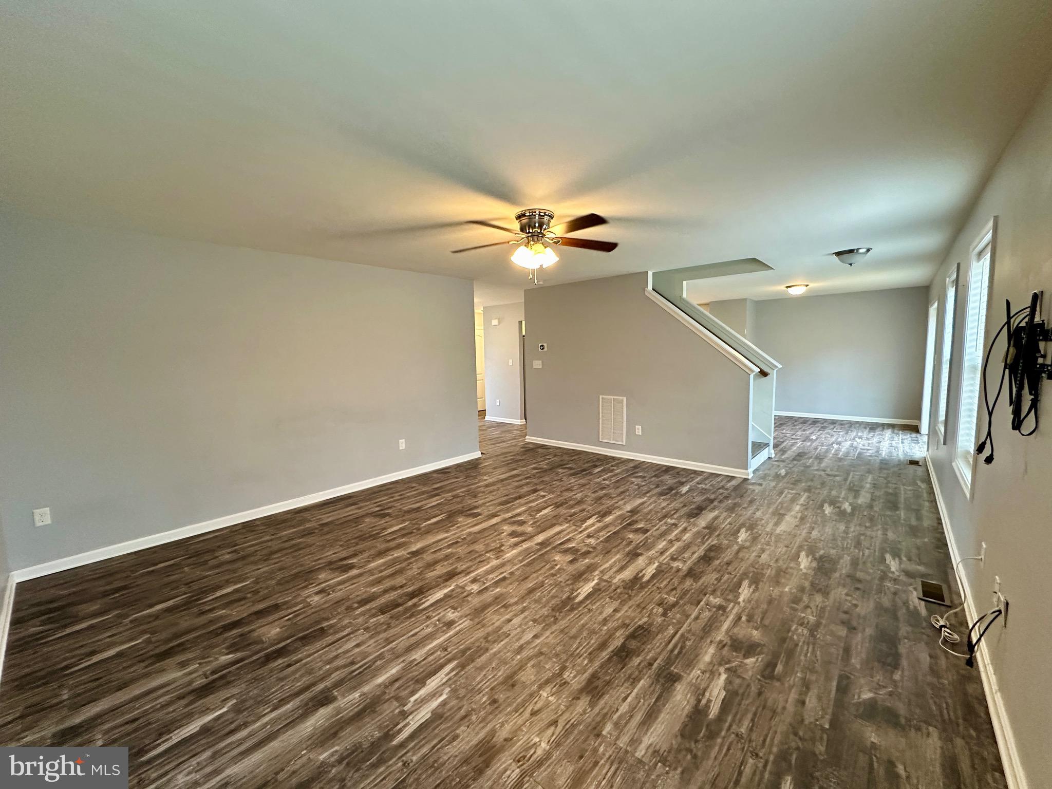 326 Sweeping Mist Circle Frederica, DE 19946 - Photo 7 of 37 wooden floor in an empty room