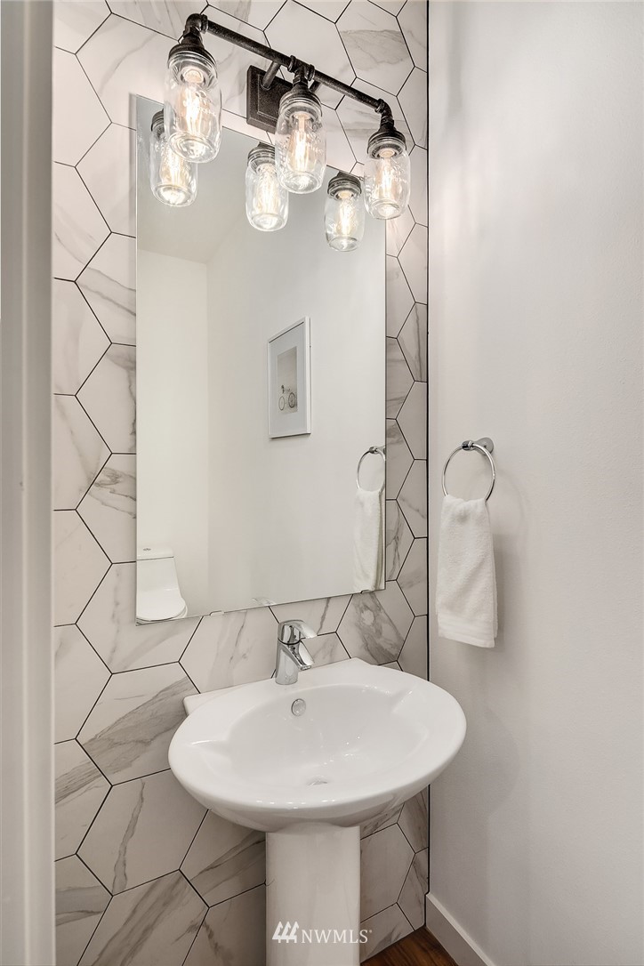 1306 Yakima Avenue South Seattle, WA 98144 - Photo 14 of 29 a bathroom with a sink and mirror