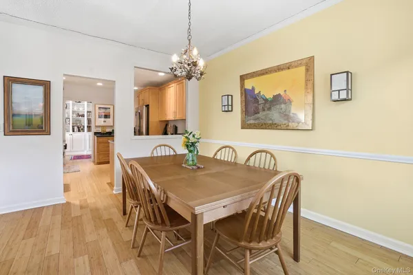 a dining room with wooden floor