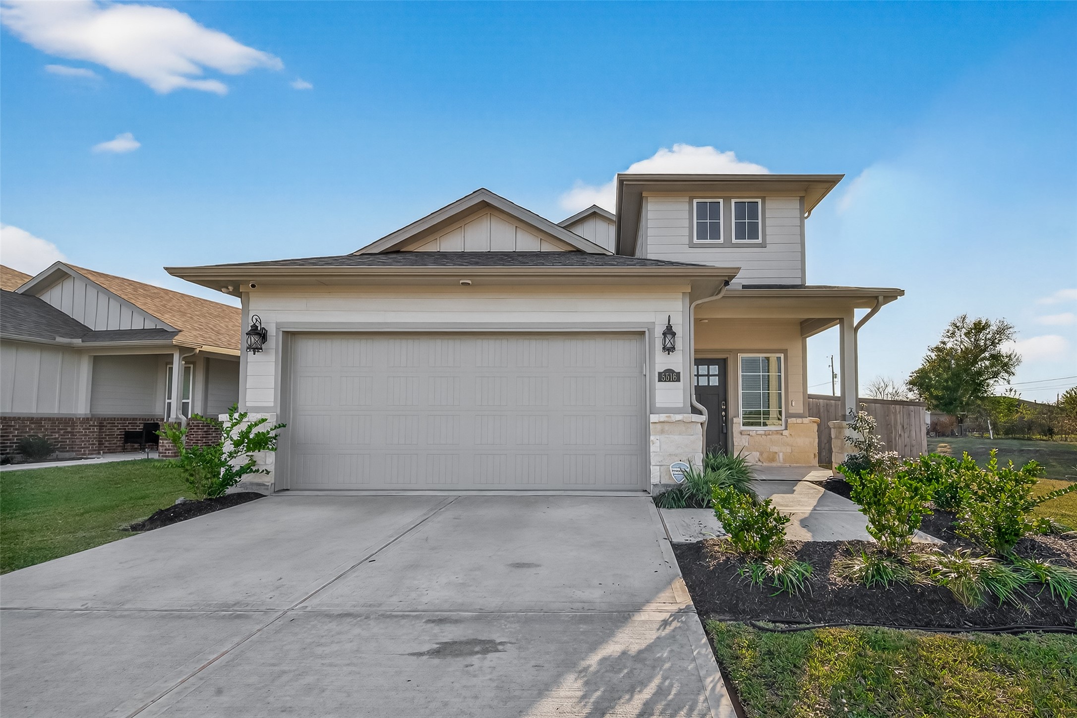 5516 Madden Lane Houston, TX 77048 - Photo 2 of 33 a front view of a house with garden