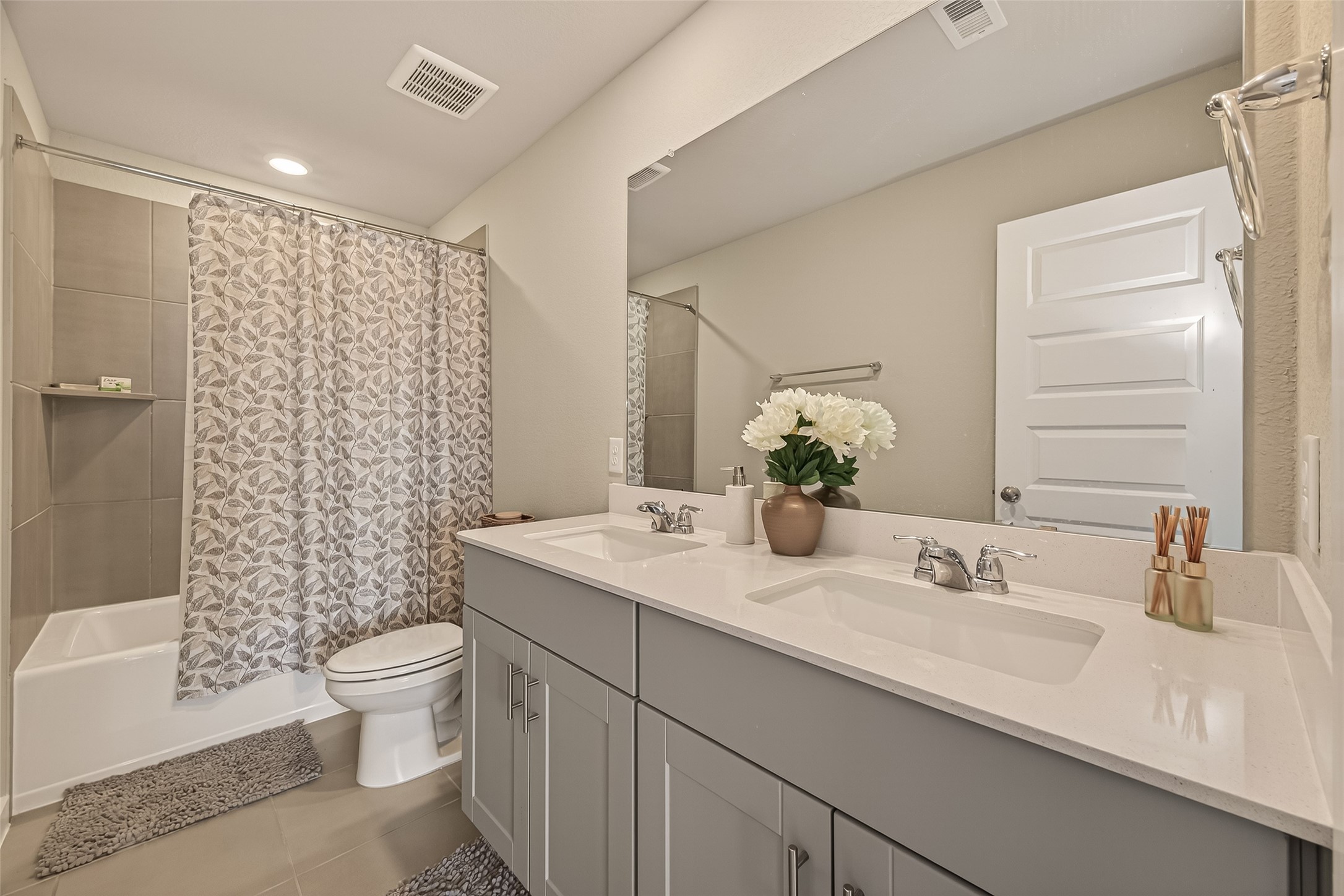 5516 Madden Lane Houston, TX 77048 - Photo 25 of 33 a bathroom with a sink a toilet and shower