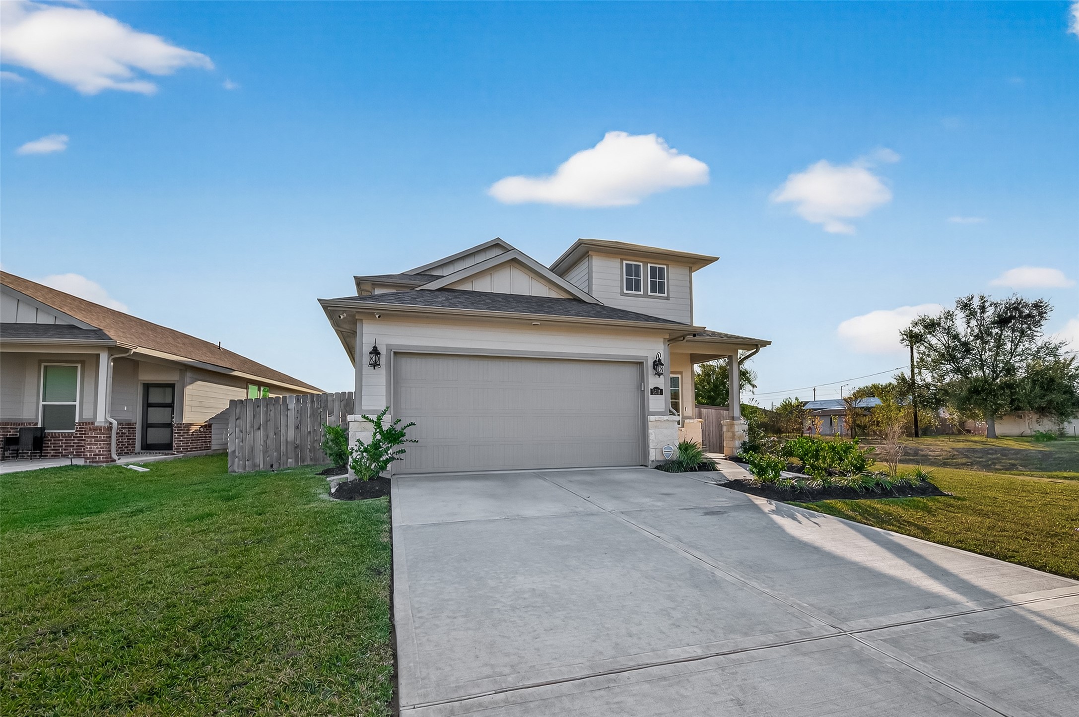 5516 Madden Lane Houston, TX 77048 - Photo 33 of 33 a front view of a house with a yard and garage
