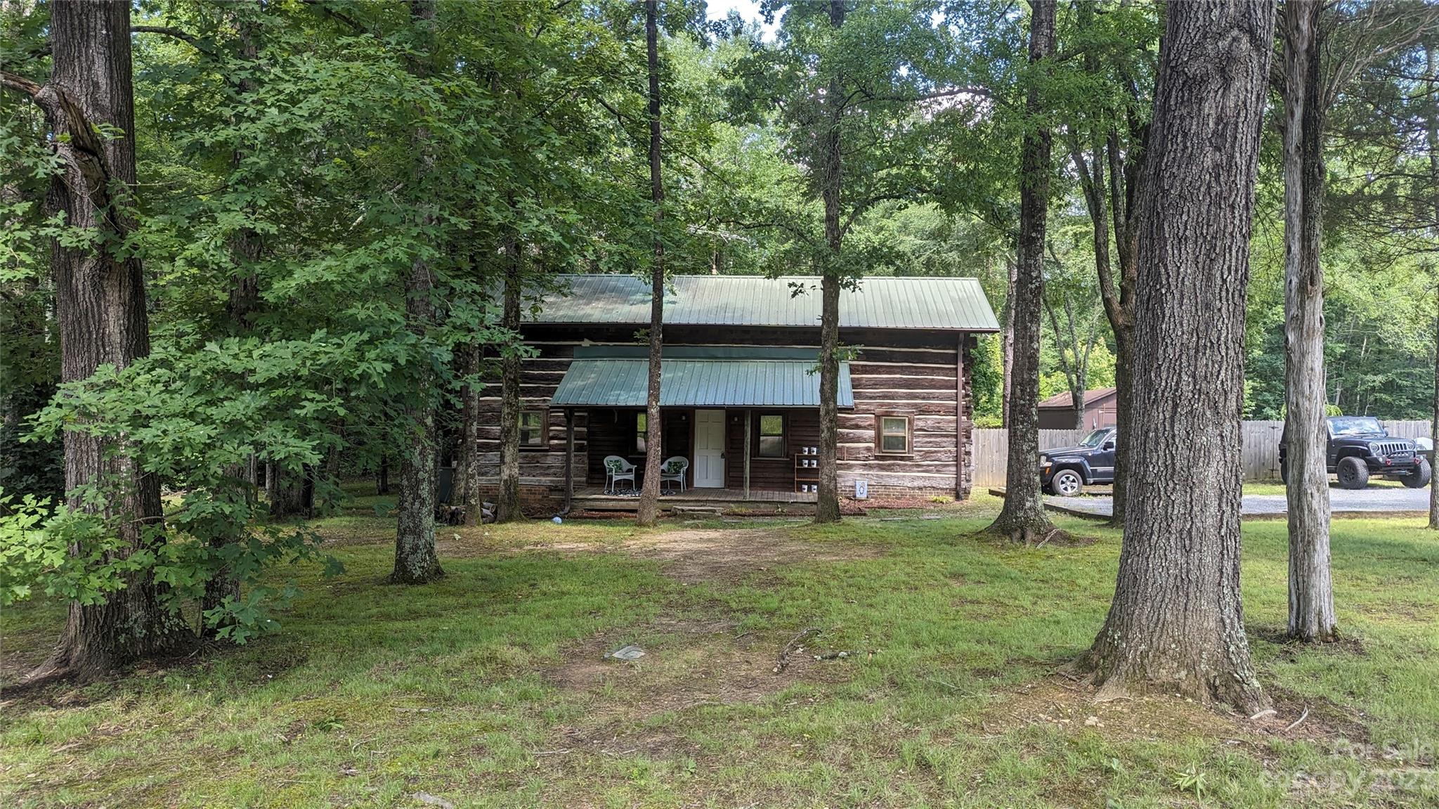 334 Ridgeview Drive Mocksville, NC 27028 - Photo 2 of 21 a view of a house with backyard and a tree