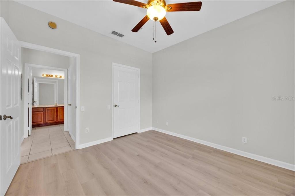 13524 Turtle Marsh Loop, Unit 621 Orlando, FL 32837 - Photo 17 of 26 a view of entryway and hall with wooden floor